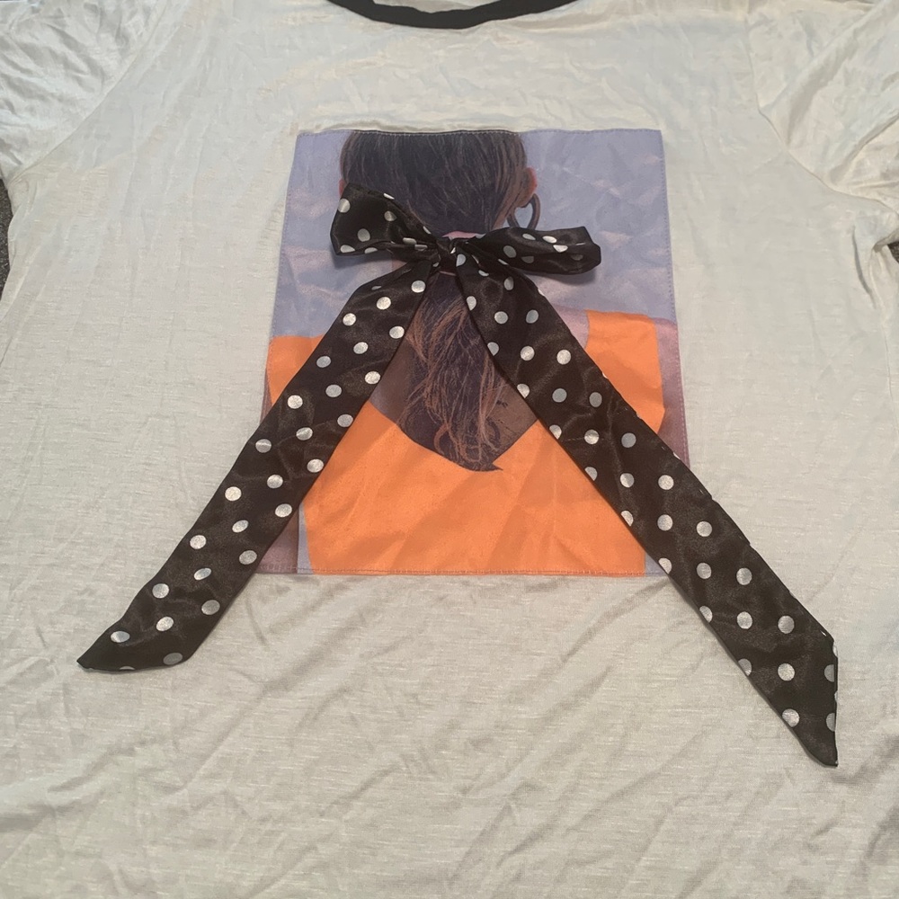 Santory Ladies “Ponytail & Ribbon” T-shirt. Size Large. NWT